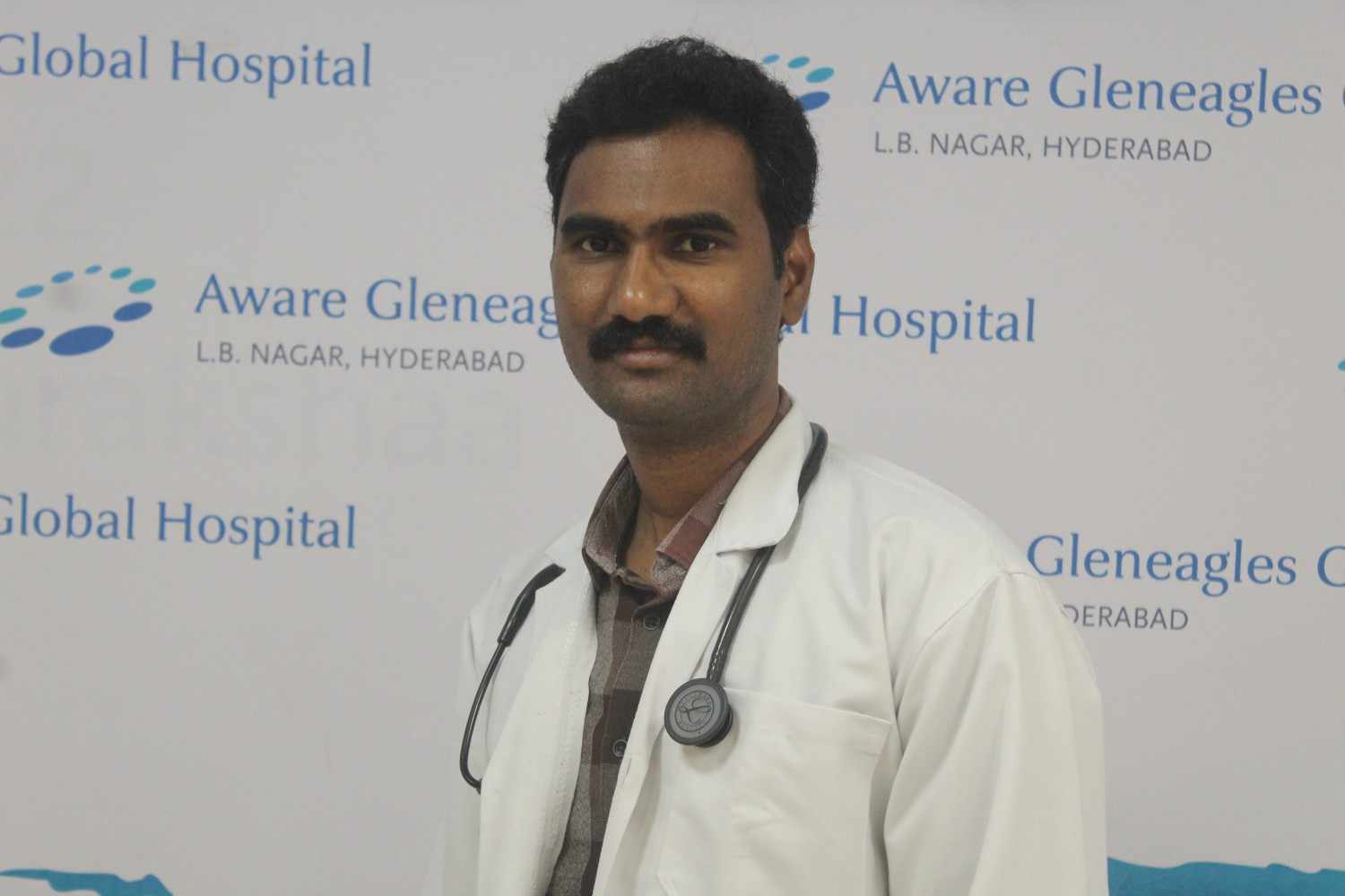 Dr Ramesh A